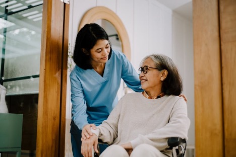 Woman Taking Care of her Older Parent who is Repeating Herself